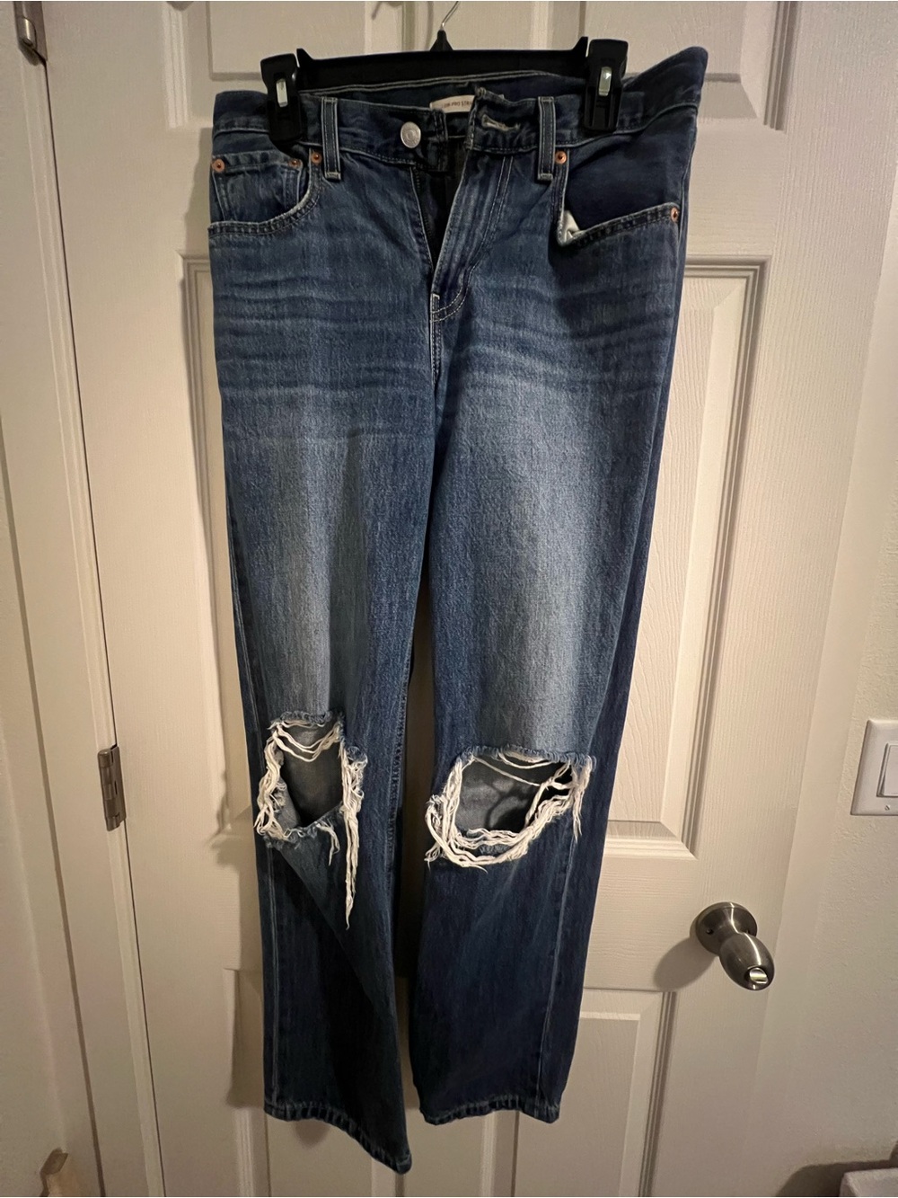 Levi's Straight Leg Jeans in Medium Blue with Distressed Knees